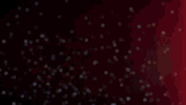 a sword is flying through a red and black background