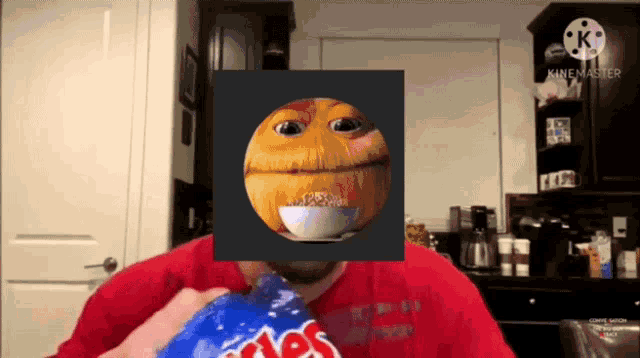 a man in a red shirt holds a bag of twizzlers