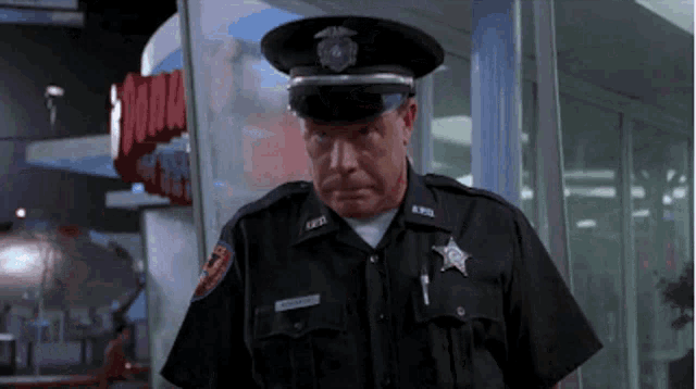 a man in a police uniform has a name tag that says ' williams '