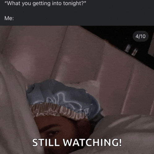 a picture of a person laying in bed with the caption still watching