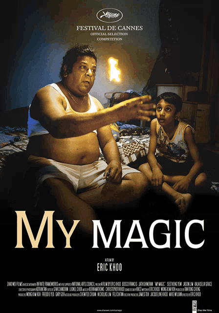 a movie poster for my magic shows a man and a boy on a bed