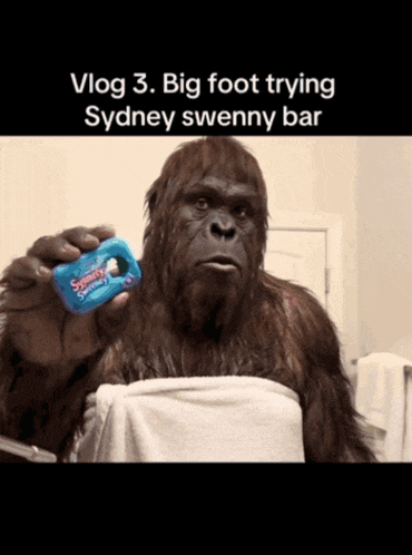 a sydney sweenny bar is being held by a big foot