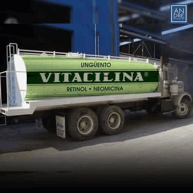 a green and white truck with the word vitacelina on the side