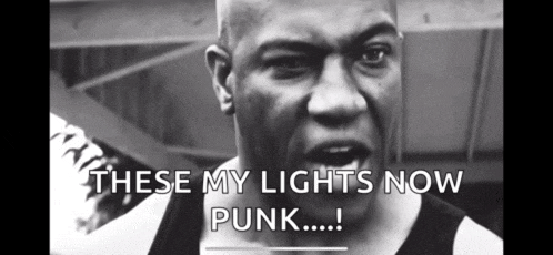 a black and white photo of a man with the words these my lights now punk