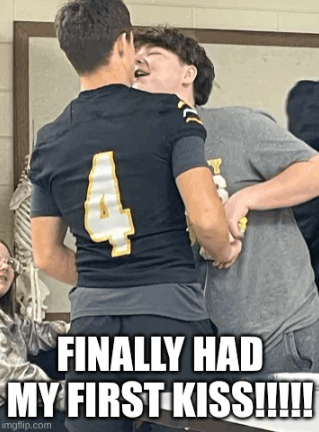 a football player with the number 4 on his back kissing another player