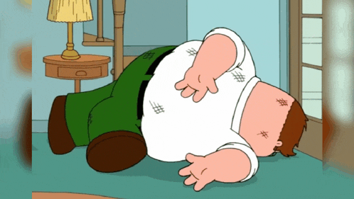 peter griffin from family guy is laying on his back on the floor