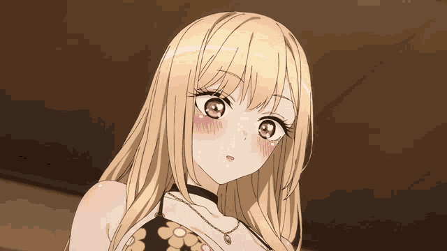 a blonde anime girl with pink eyes and a necklace