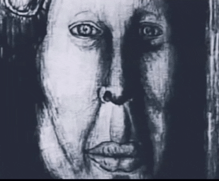 a black and white drawing of a woman 's face with a shadow on the wall .