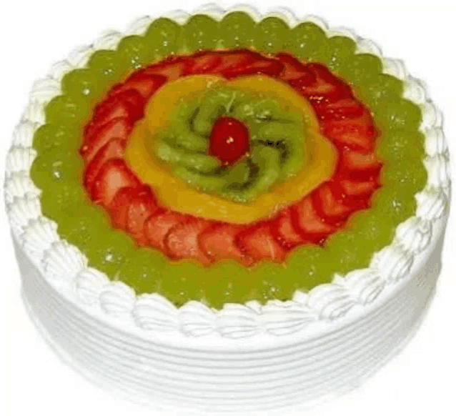 a fruit cake with strawberries , kiwi , and grapes on a white background .