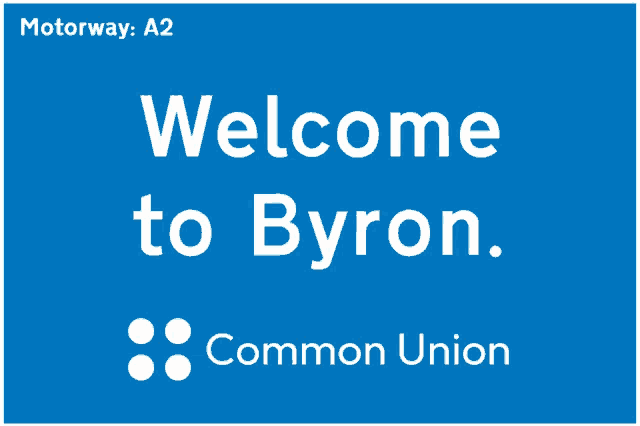 a blue sign that says motorway a2 welcome to byron common union