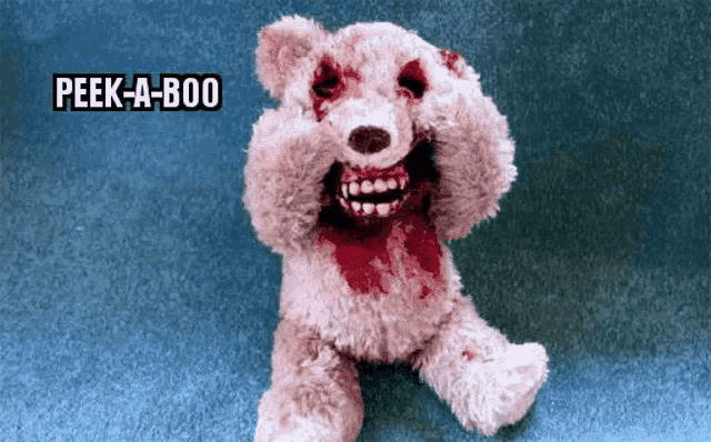 a bloody teddy bear with the words peek-a-boo on the bottom right