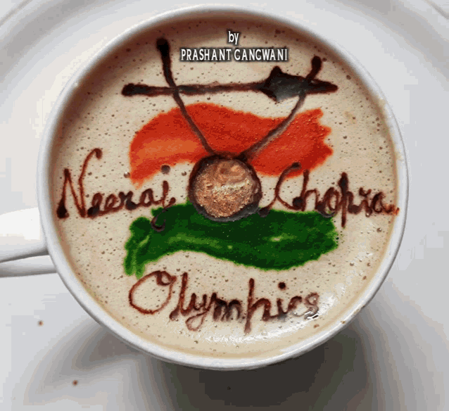 a cup of coffee with naerai chopra olympics written on the foam