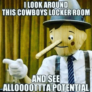 a wooden puppet with a long nose and a hat is pointing at a cowboy locker room .