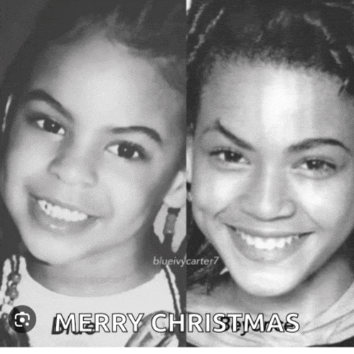 a black and white photo of a child and a woman with the words merry christmas written on the bottom