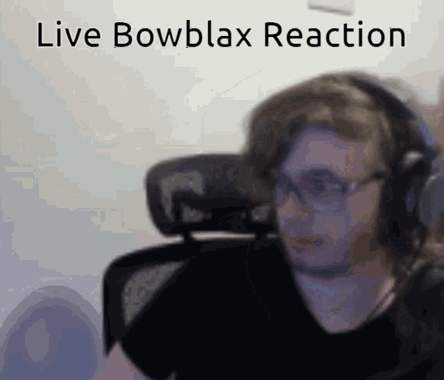 a man wearing headphones with the words live bowblax reaction written above him