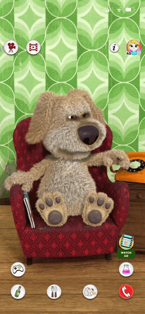 a stuffed animal is sitting in a chair with a watch ad icon in the corner