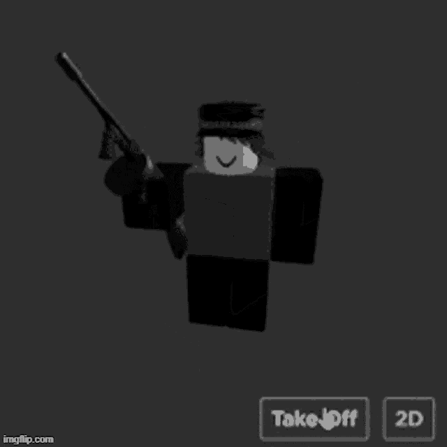 a man in a hat is holding a gun in his hand .