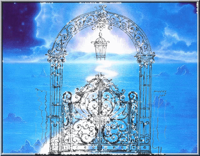 a wrought iron gate with a lantern hanging over it