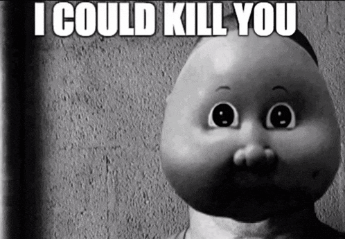 a black and white photo of a doll with the words i could kill you above it