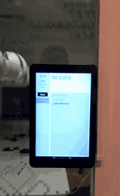 a tablet with a screen that says 3:00 pm on it