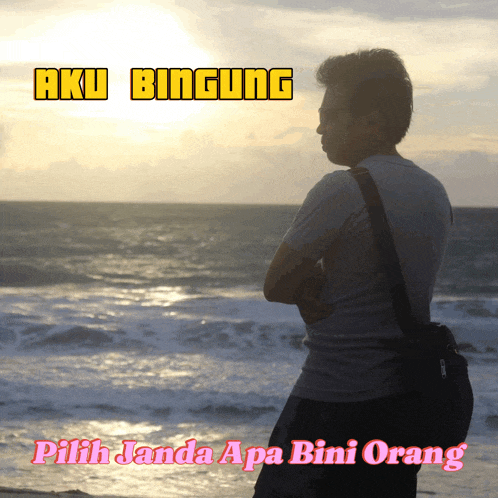 a man standing on a beach looking at the ocean with the words aku bingung pilih jada apa bini orang above him