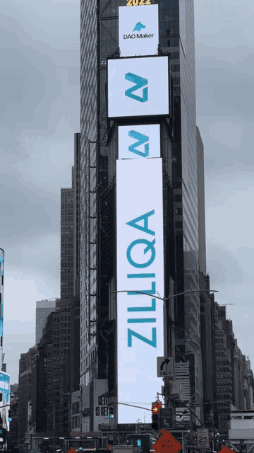 a large billboard on a building that says zilliqa on it