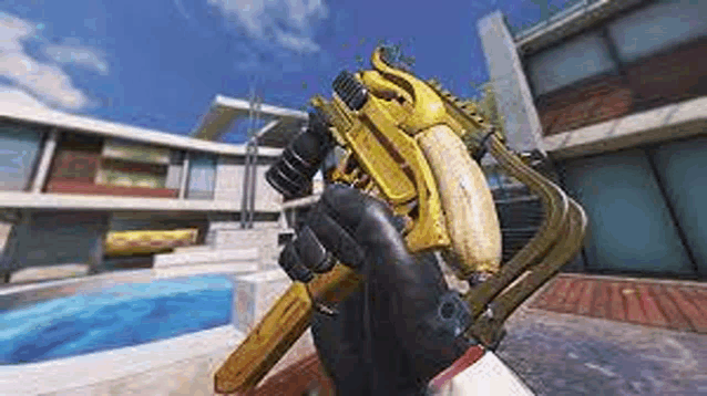 a person is holding a gun with a banana on it in a video game .