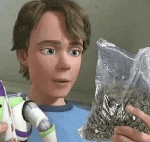 buzz lightyear from toy story is holding a bag of marijuana in his hand .