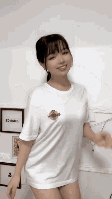 a woman wearing a white t-shirt with the word choice on the back