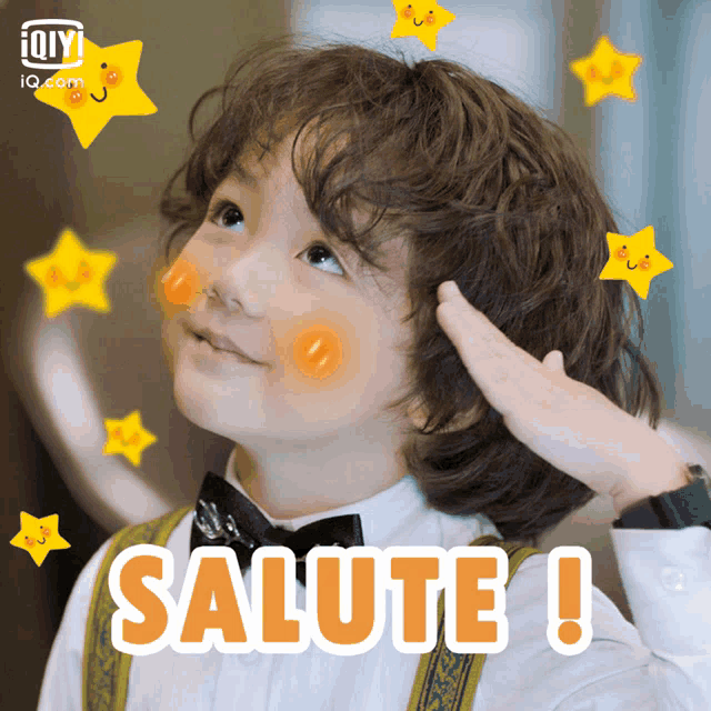 a little boy salutes with the word salute written on his face