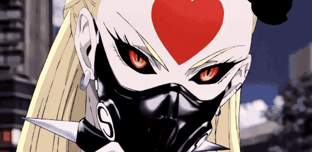 a woman wearing a black mask with a red heart on her face