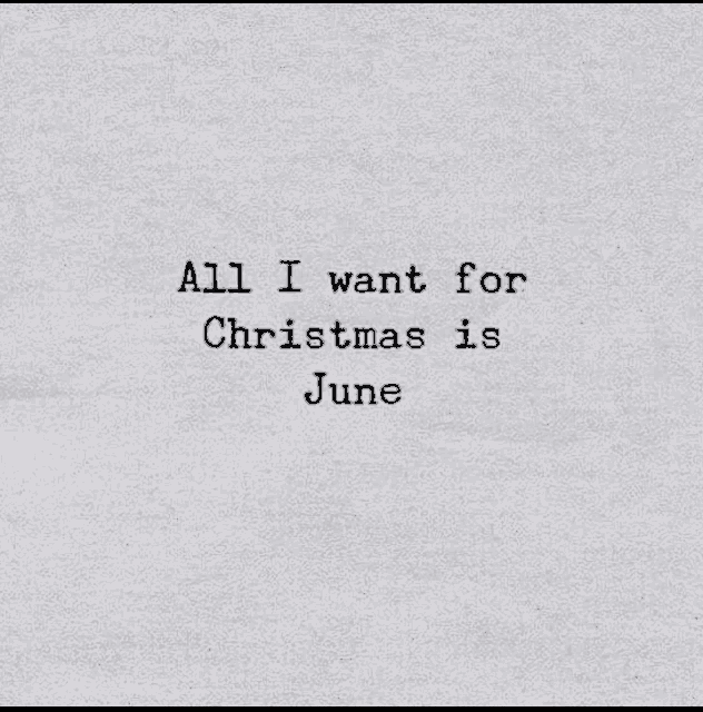 all i want for christmas is june is written on a piece of paper on a typewriter .