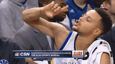 a basketball player is making a funny face while sitting in the stands during a game sponsored by the elias sports bureau