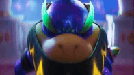 a close up of a cartoon character wearing a mask and a purple and yellow outfit .