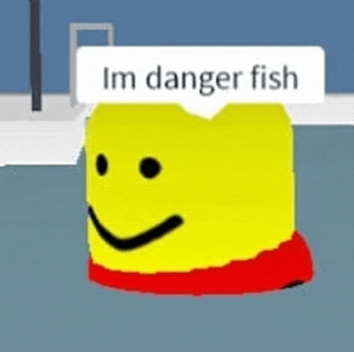 a yellow block with a smiley face and the words `` i 'm danger fish '' written on it .