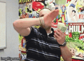 a man covering his face in front of a hulk comic book