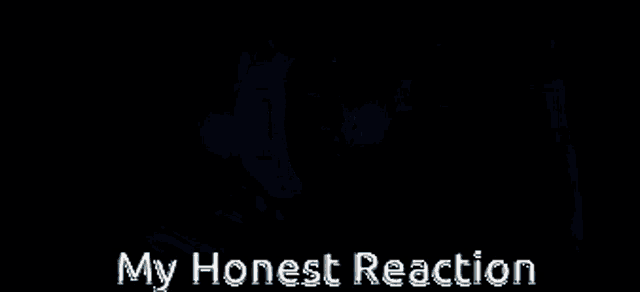 a close up of a person 's face with the words `` my honest reaction '' above it