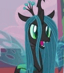 a close up of a cartoon pony with long blue hair .