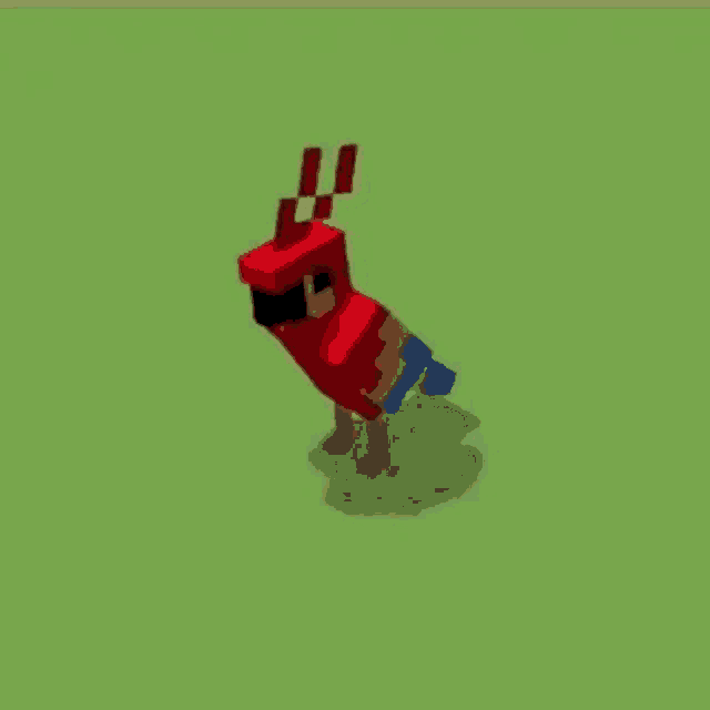 a red bird is standing on a green field in a video game .