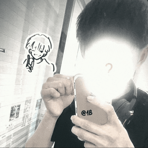 a man taking a selfie with a phone that says @ 4b