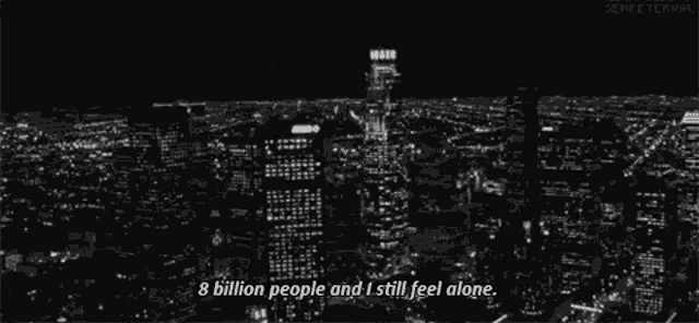 a black and white photo of a city at night with a quote that says 8 billion people and i still feel alone