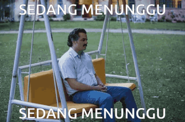 a man sits on a swing with the words sedang menunggu written below him