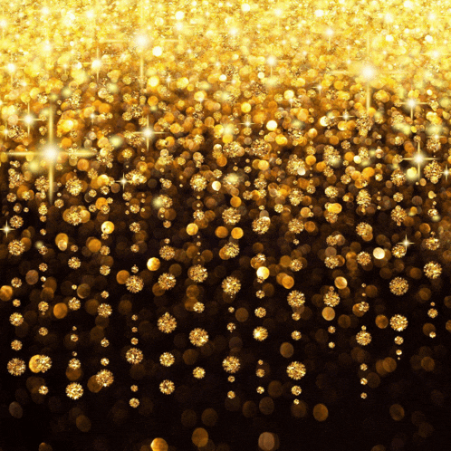 a black background with gold sparkles falling from the top