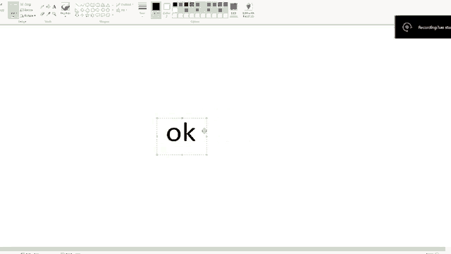 a computer screen shows the word ok in a rectangular shape