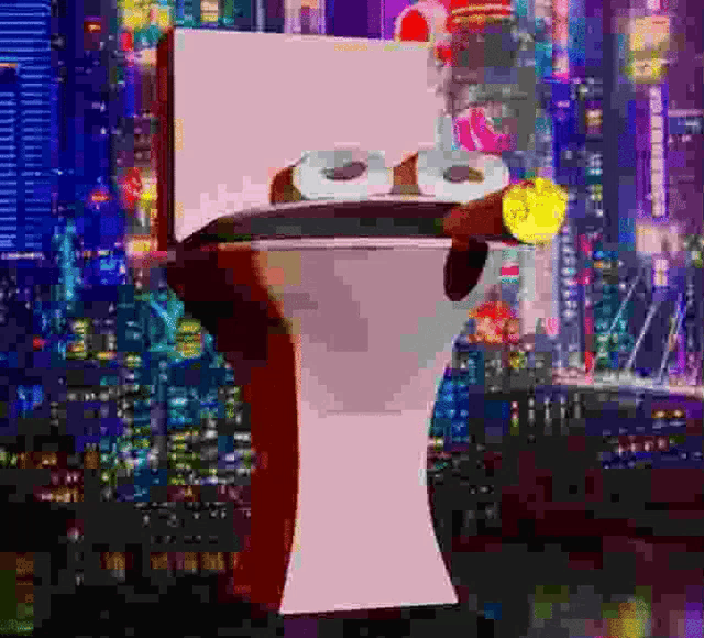 a toilet with a cigar sticking out of it in front of a city at night .