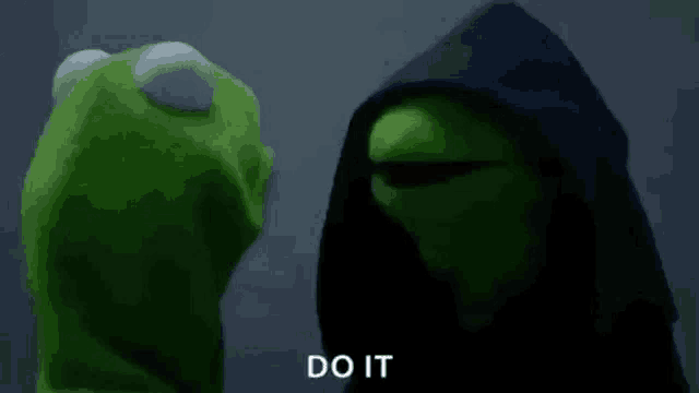 kermit the frog is wearing a black hoodie and standing next to a muppet .