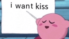 kirby holding a sign that says i want kiss