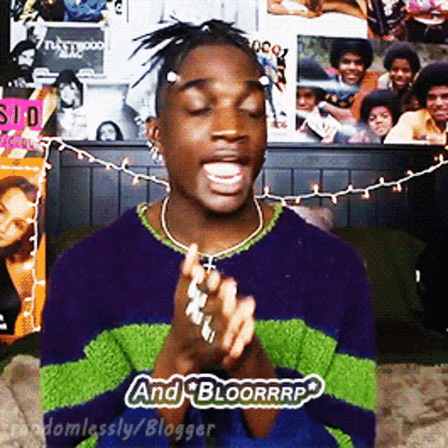 a man wearing a green and blue striped sweater with the words and bloorrrp on it