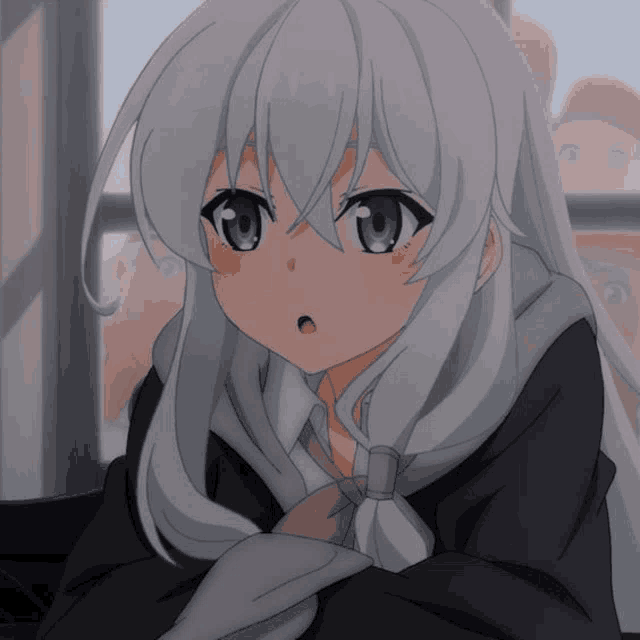 a close up of a girl with white hair and a surprised look on her face