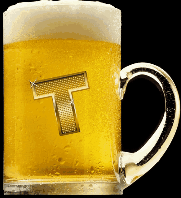 a mug of beer with the letter t on the side